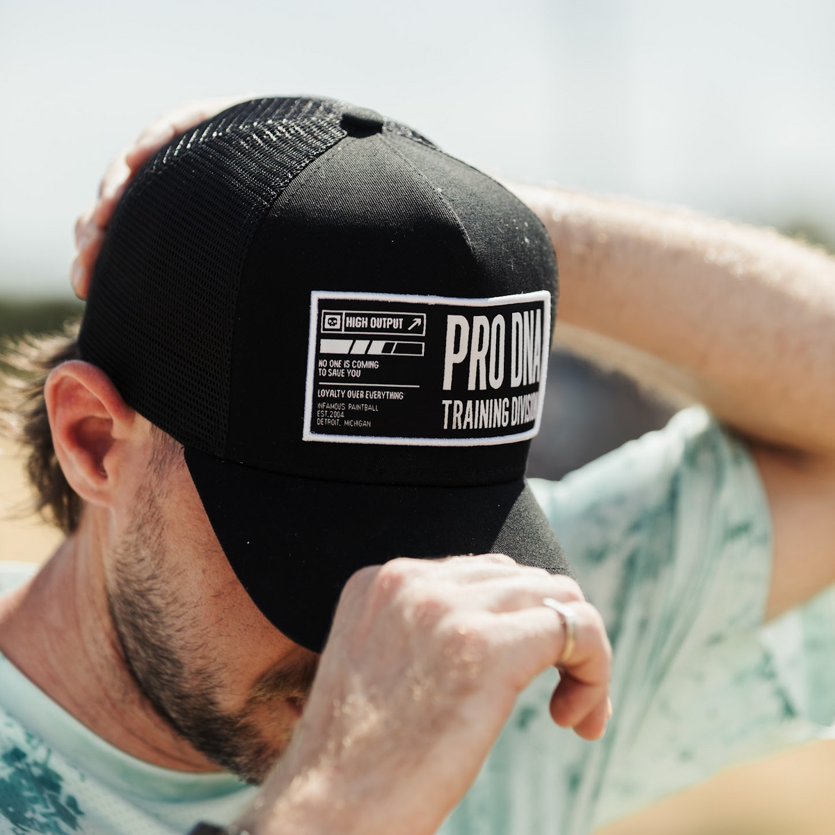 INFAMOUS™ Snapback Trucker Hat - Training Division - Black